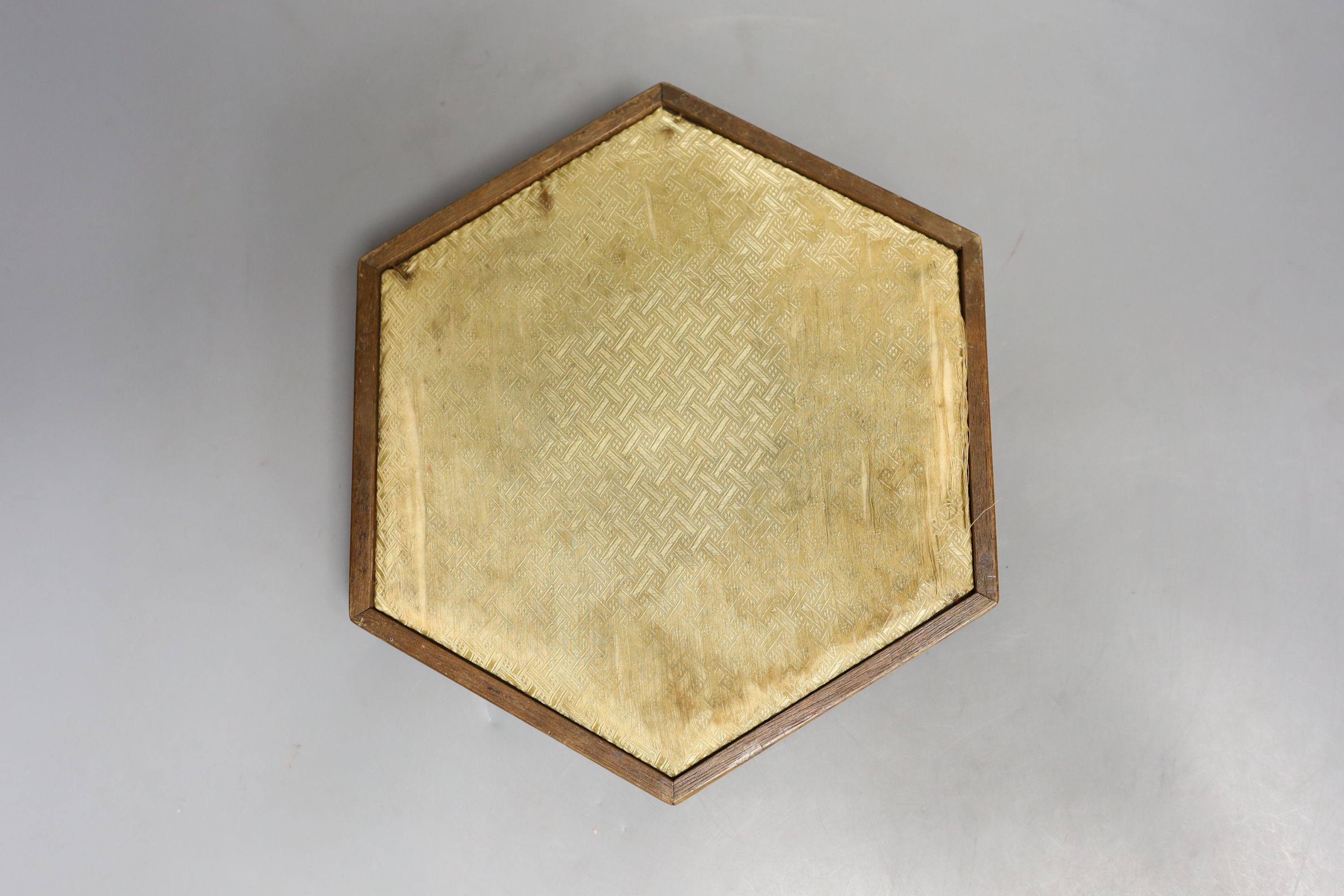 An early Victorian hexagonal tray with ribbon worked embroidery on silk 25cm